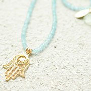 Faceted semi-precious bead necklace with large Hand of Fatima