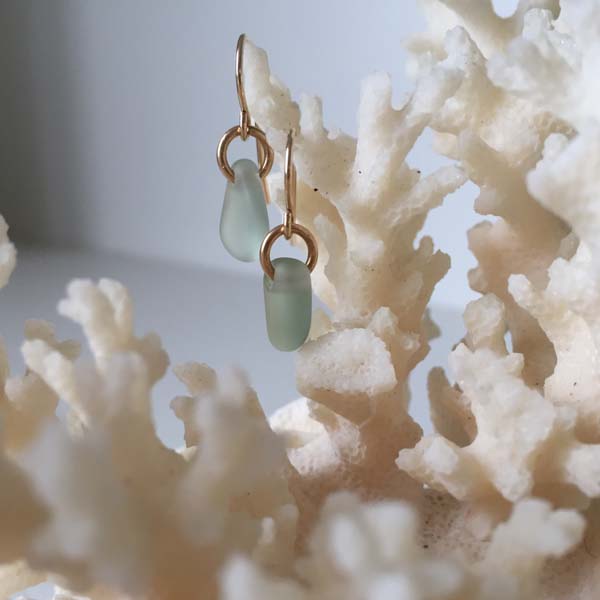 Gold earrings with sea glass drops